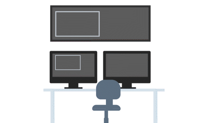 GIF illustration of a desk with multiple computer screens