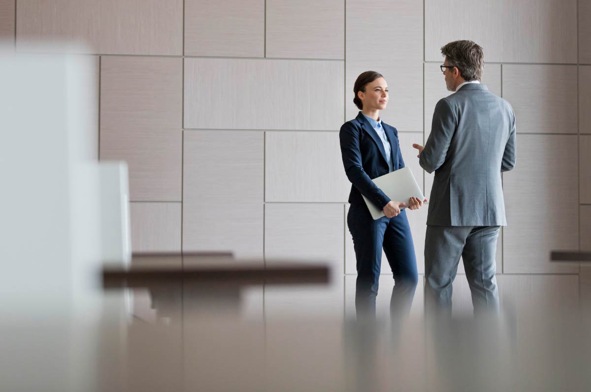 Two people talking face-to-face